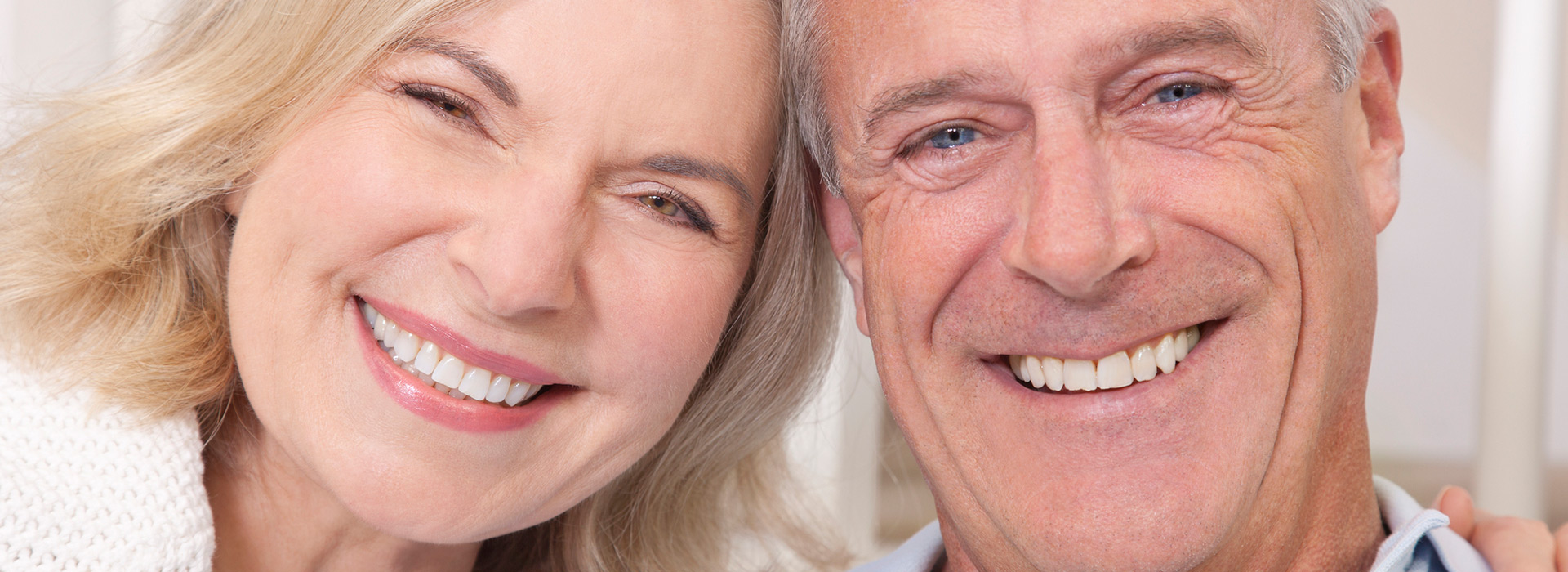 A couple after full mouth reconstruction treatments.